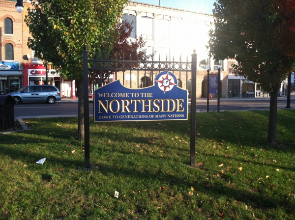 Northside :: This carved sign has a blue paint for the base and a gold paint finish for the letters. :: Syracuse, NY